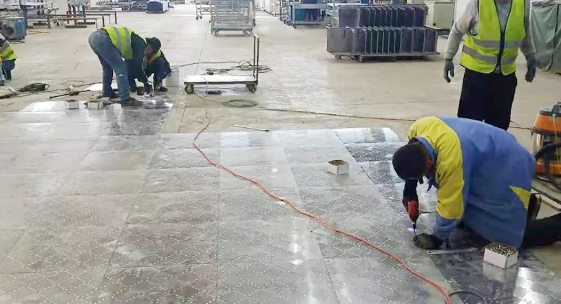 Drill holes in the laying area according to the location of the floor screw holes.