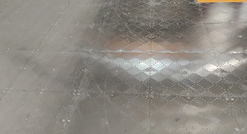 Clean excess glue from the floor surface.